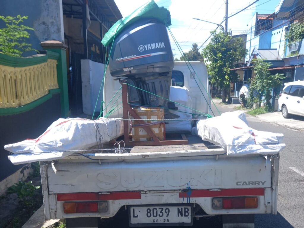 proses pengiriman body motor surabaya manado
